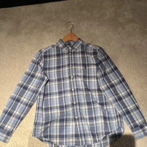 En skjorta Ralph Lauren - Bra skick har använt några gånger.