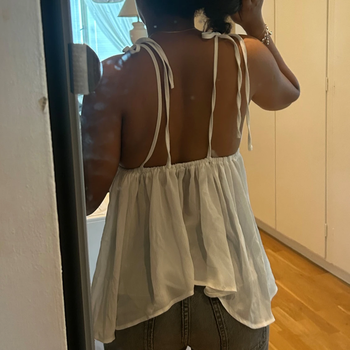 Vit ärmlös linnetopp - 92