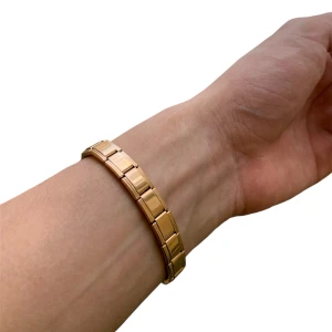 Ros Guld Italian charms Bracelet  - Hej! Säljer en Rose Gold Italian Charms Bracelet i nyskick. Armbandet går att justera till vilken storlek om helst och de går att ta bort och lägga till charms.