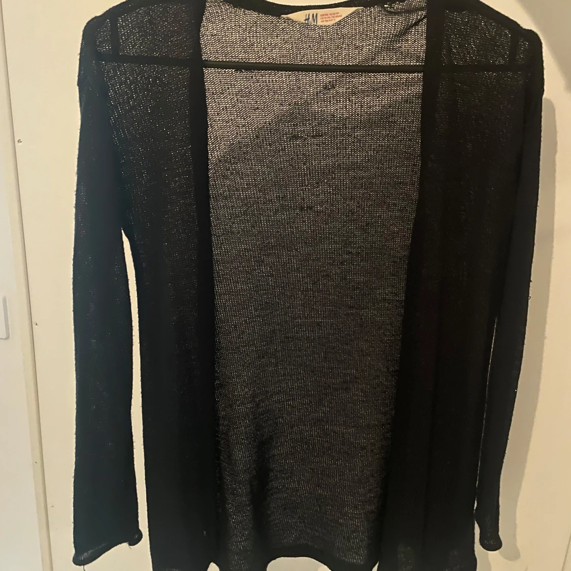 Svart transparent kofta