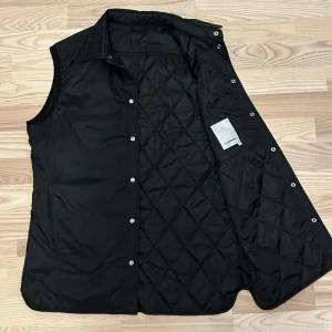 Svart quiltad väst - J.lindeberg väst