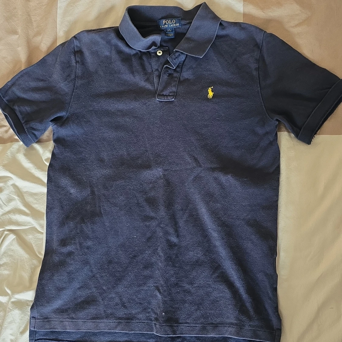 Mörkblå pikétröja från Ralph Lauren