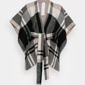 Poncho - Supersnygg poncho! Använd fåtal gånger, fint skick! Skriv för fler bilder