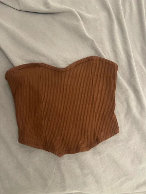 Brun tubtopp - Superfin brun tubtopp som endast är använd 1 gång