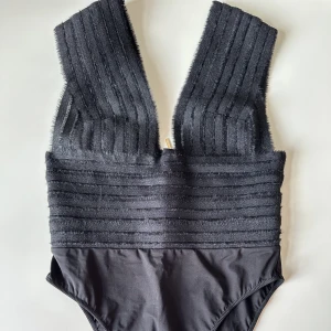 Body från Livy - Body från Livy i superfint skick. Köpt för ca 2100 kr.