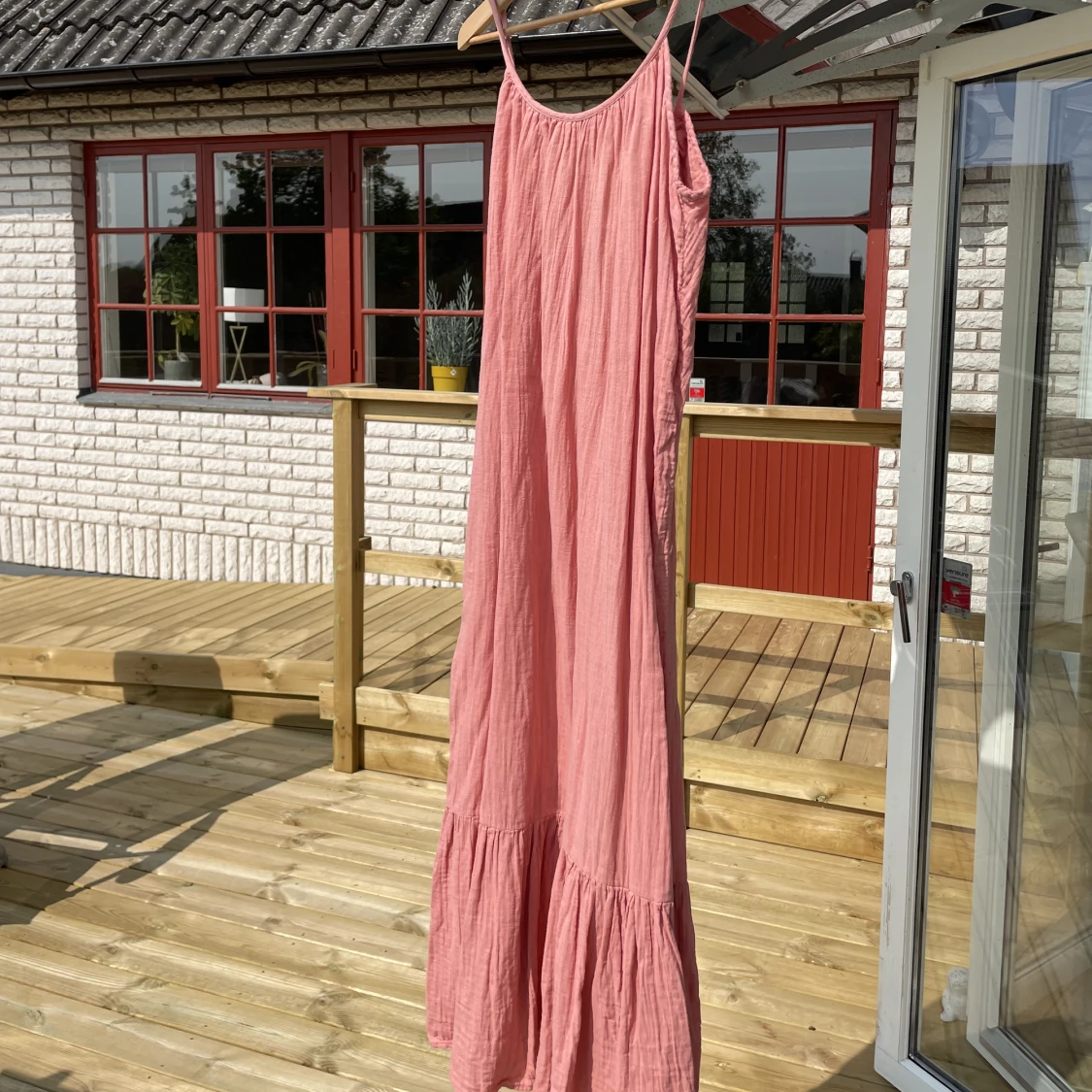 Rosa flowig långklänning