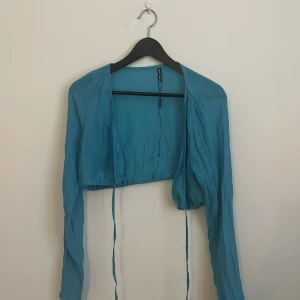 Blå kort cardigan - Aldrig använd 