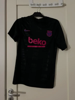 T-shirt  - En välvårdad t-Shirt som är använd ett få antal gånger