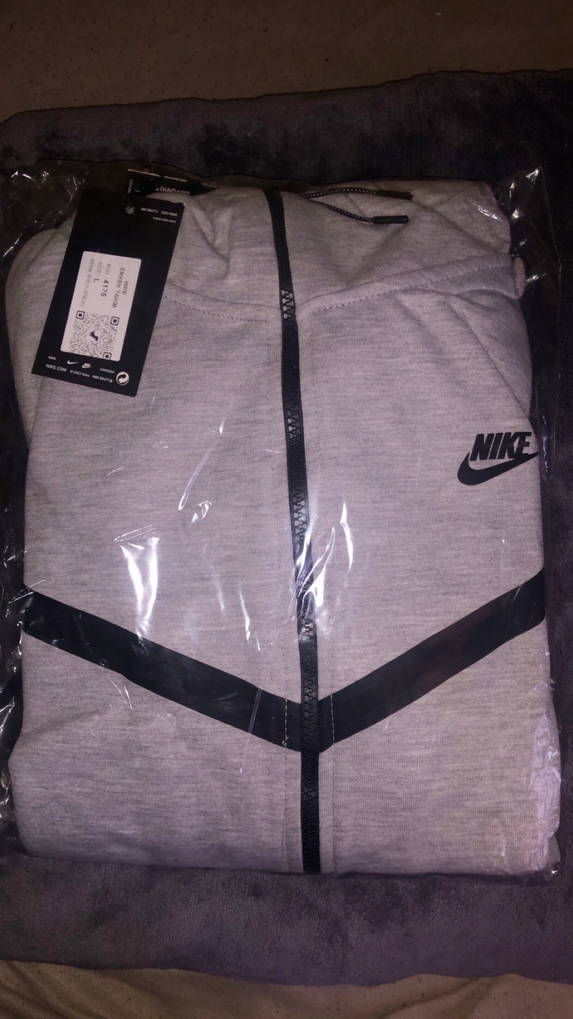 Grå Nike tech kofta