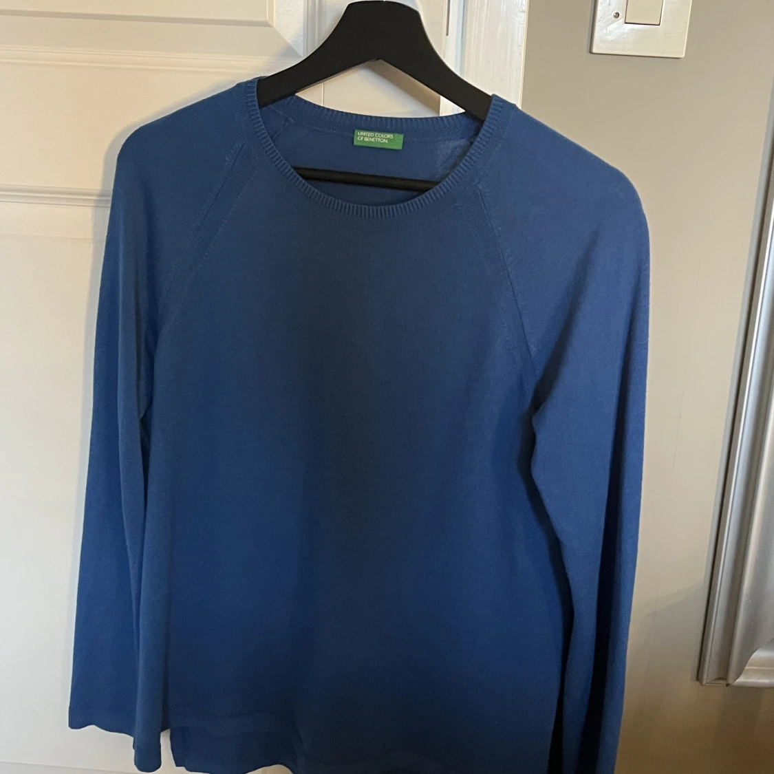 Tunn blå stickad - 91