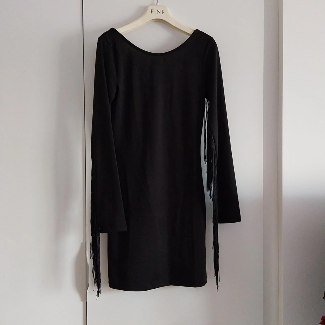 Klänning med fransar