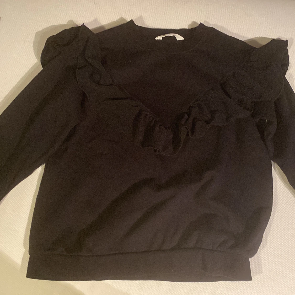 Svart tröja