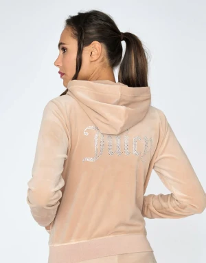 Jucy sätt  - Beiget jucy sätt, inte använt så mucket. Den gamla modellen på byxorna med fickor och den nya modellen på koftan där det står jucy på ryggen med strass. 