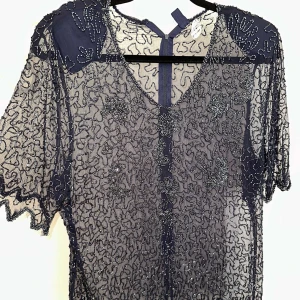 Unik topp - Fest sheer topp med pärlor eller sequin