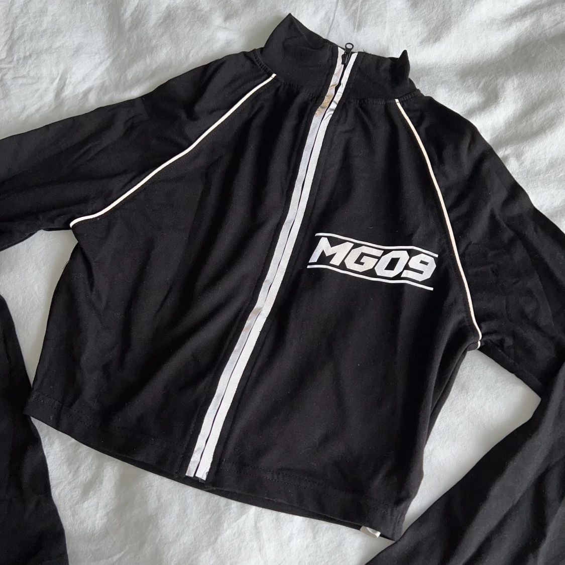 Topp med reflexiva detaljer  - 90