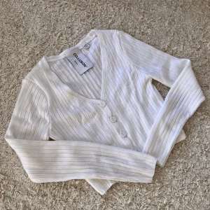 Kofta - Kofta från collusion. Storlek 38.