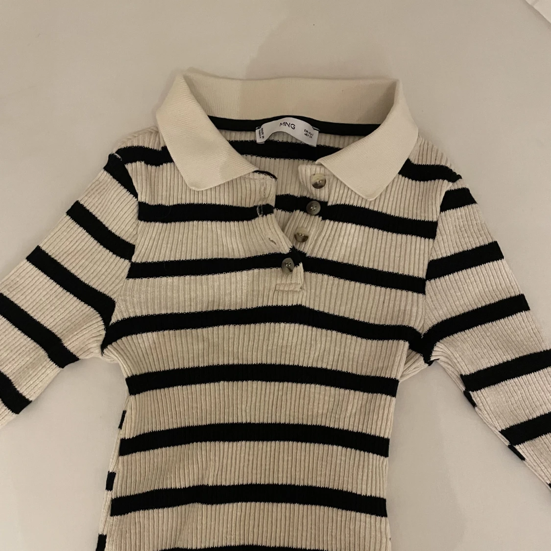 Stickad tröja mango