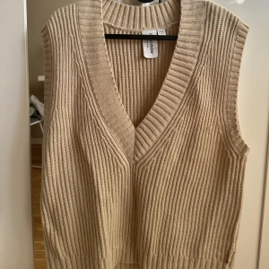 Väst - Beige väst från collusion