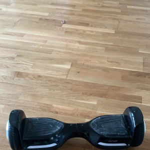 Hoverboard - Fungerar som vanlig går att tvätta av lite på kanterna, sladd ingår