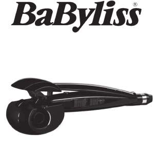 Babyliss locktång i svart.  I annvänt skick, har ett par år på nacken men fungerar felfritt.