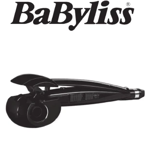 Babyliss locktång - Babyliss locktång i svart.  I annvänt skick, har ett par år på nacken men fungerar felfritt.