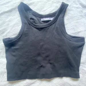 Topp - En ribbad topp som är köpt på lager 157