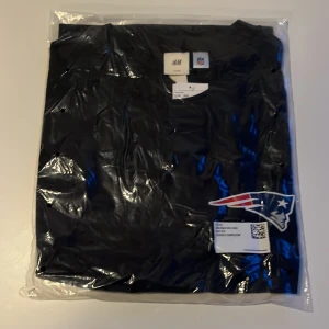 NFL TISHA XXL - Oöppnad