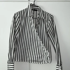 Striped wrap blouse - Nice striped wrap blouse from DKNY!