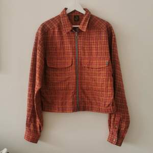 Cute beyond retro jacket made out of recycled wool flannel. It's thin but warm. Cute zipper. Size S. See ref pic of me wearing it, I'm 160cm tall. 