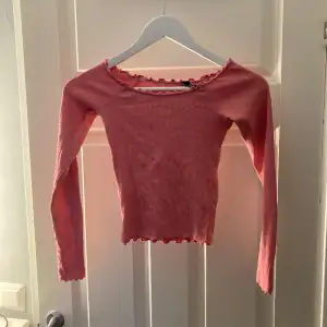Rosa tröja från BikBok, storlek Xs