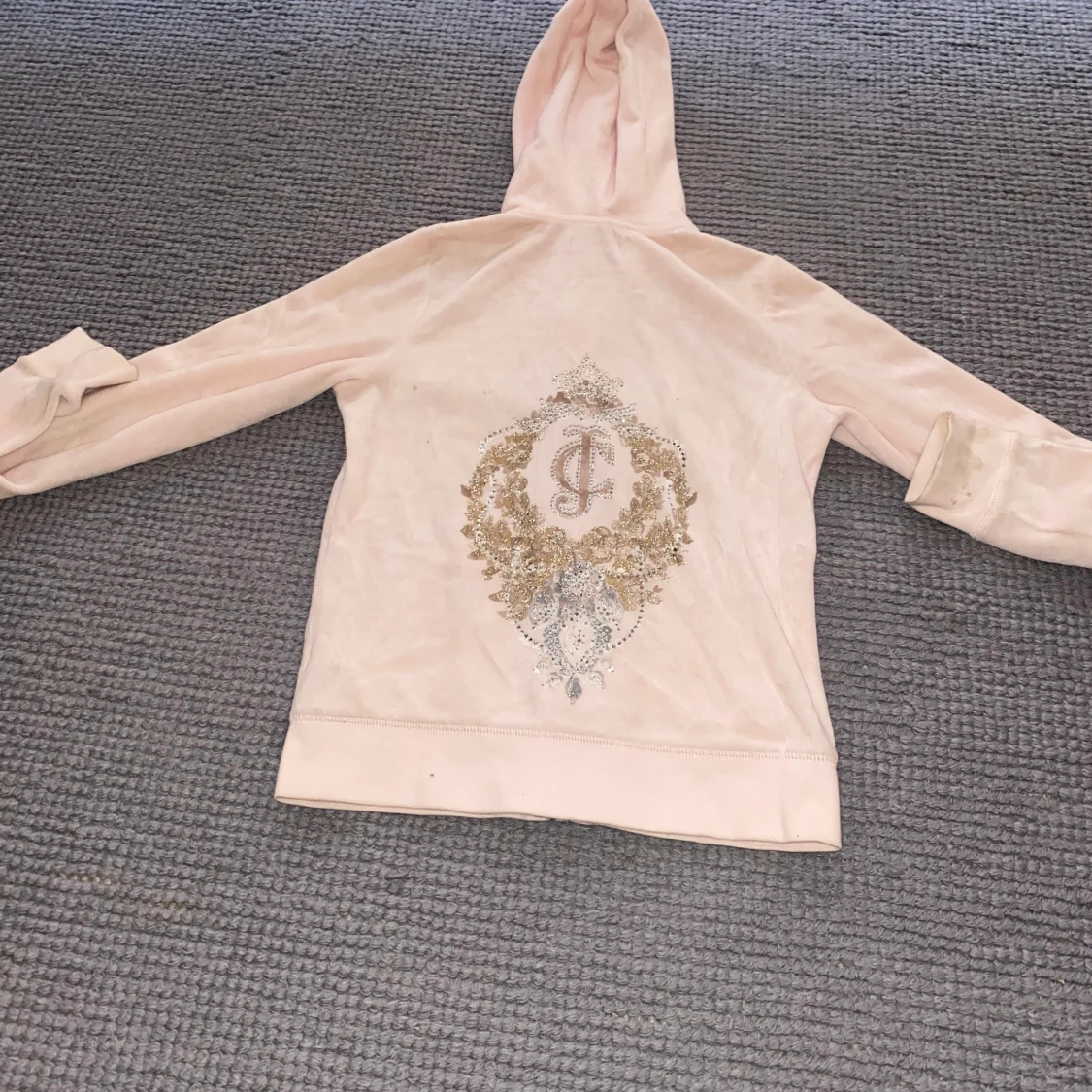 Ljusrosa tracksuit från Juicy Couture