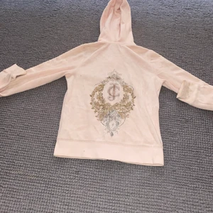 Ljusrosa tracksuit från Juicy Couture - Ljusrosa velour tracksuit från juicy couture.