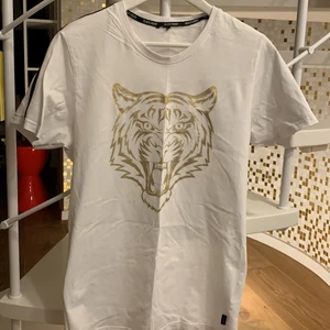 T-shirt  - T-shirt med lejon tryck