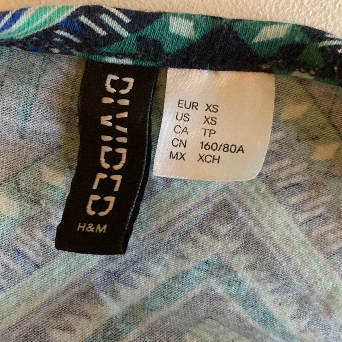  Grönt linne från divided.   - 91