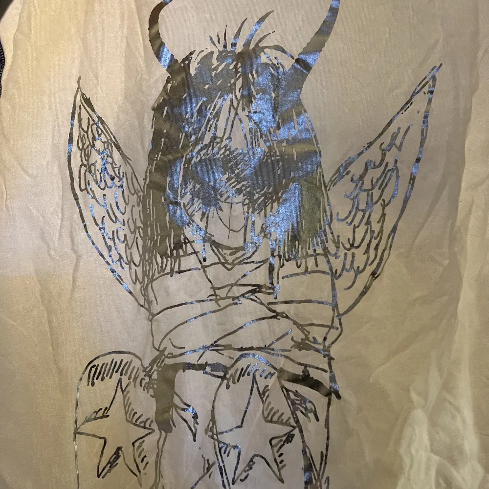 T-shirt från Converse x Sadboys collaben i storlek L. T-paidat.