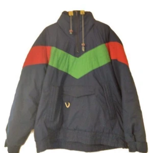 Windbreaker / 80-tal / Retro / Vintage / 90-tal - Kom snyggast till festen! Unik anorak från sent 80- eller tidigt 90-tal. Inga revor eller sprickor - hel och ren med tre fickor. 