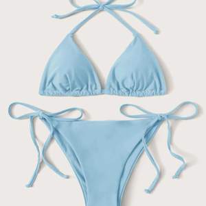 Jättefin oanvänd ljusblå bikini med knytning. Både topp och underdel är anpassningsbara.😜👍🏼👙