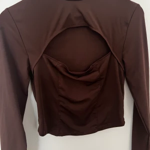 Brun topp - Från nelly