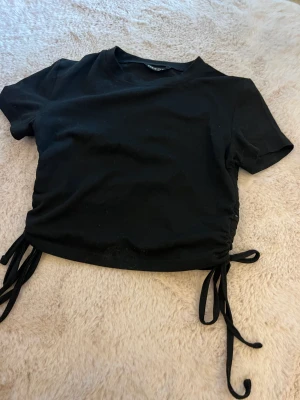 T-shirt med dragsko - T-shirt med dragsko