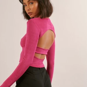 Rosa topp  - Rosa topp från nakd x margaux i storlek m. 