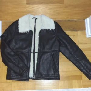 Jacka - Jacka med läder och päls