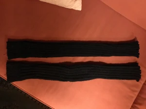 Benvärmare  - Svarta snygga resår stickade benvärmare. 