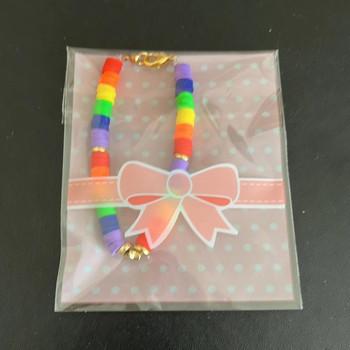 Regnbågit armband - 90