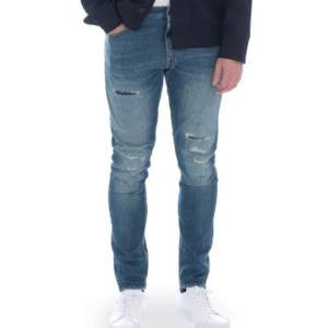 Ljusblå jeans från tiger or sweden, regular fit mot slim fit hållet. Plaggets skick är fint, lite skrynkliga. Men väldigt likt ursprungs skicket ffr beronde på märkets kvalite. Köpa från careofcarl Nypris 1259kr