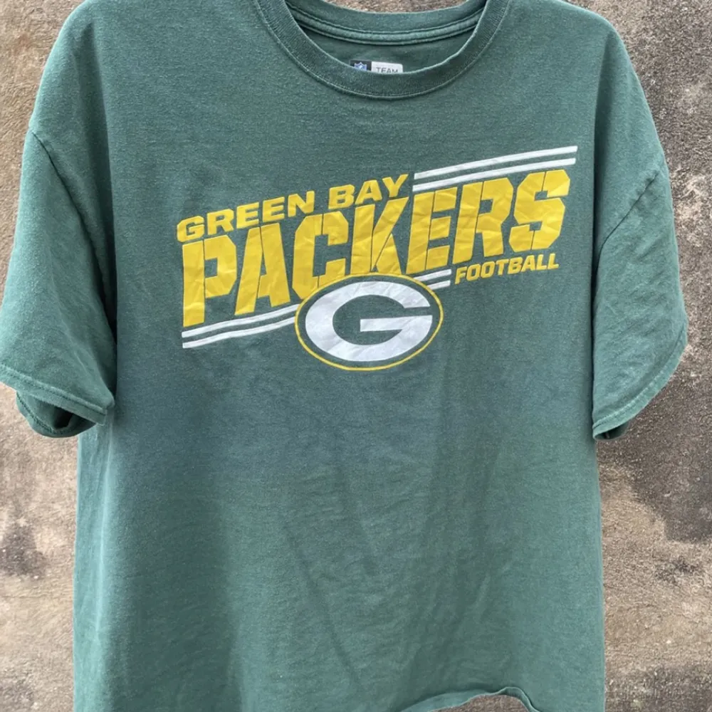 Green Bay Packers, overzize vintage T-shirt. Köpt på vintagekläder.se Använd ett fåtal gånger.. T-shirts.