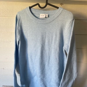 Ljusblå stickad tröja från salt  - En jättefin ljusblå stickad tröja från salt, helt oanvänd 