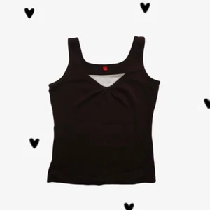 Mörk brunt linne  - Svart linne med tjocka straps och en vit detalj i urringningen. Den är helt ny och köpt från Humana. 