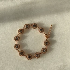 Lily and rose armband  - Rosé/guld. Köparen står för frakten.