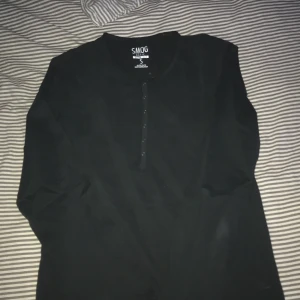 Smog tröja  - Smog långärmad tröja aldrig använd 