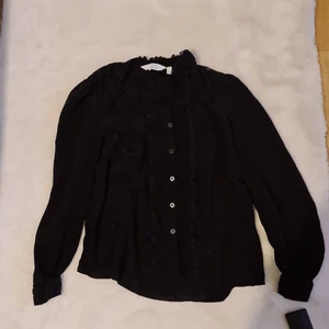 Skjorta - Skjortan är som ny. Köparen står för frakt.